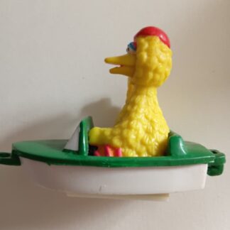Big Bird from Sesame Street in a boat toy